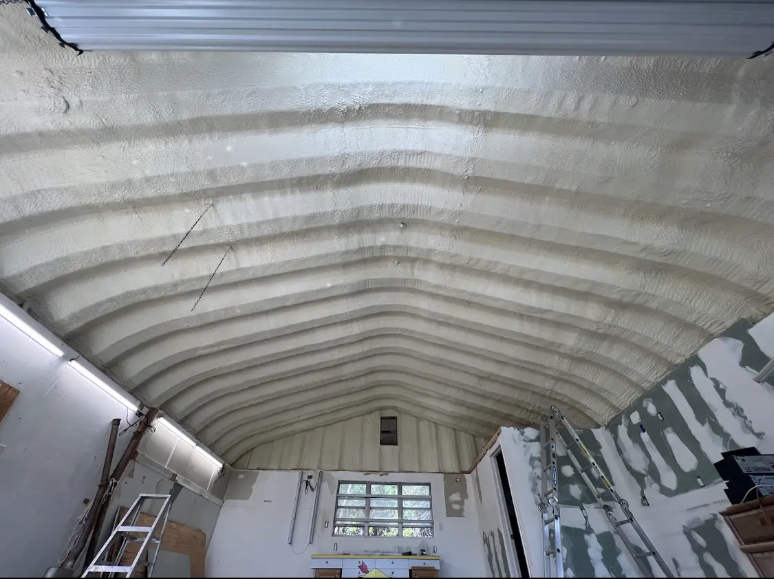 Spray polyurethane foam applied to the underside of a metal roof deck in Eastern Goleta Valley